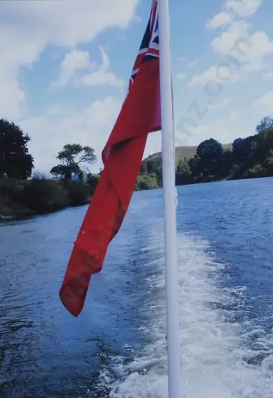 UNKNOWN - River Sailing with Flag Flying Image 1++