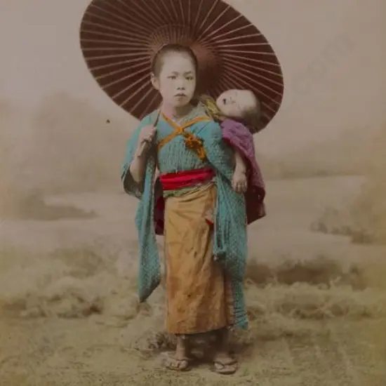 UNKNOWN - Young Nurse with Baby on Back - Handcoloured photo c.1880