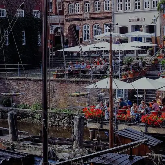 UNKNOWN Photographer - European Canal Scene with Outdoor Café