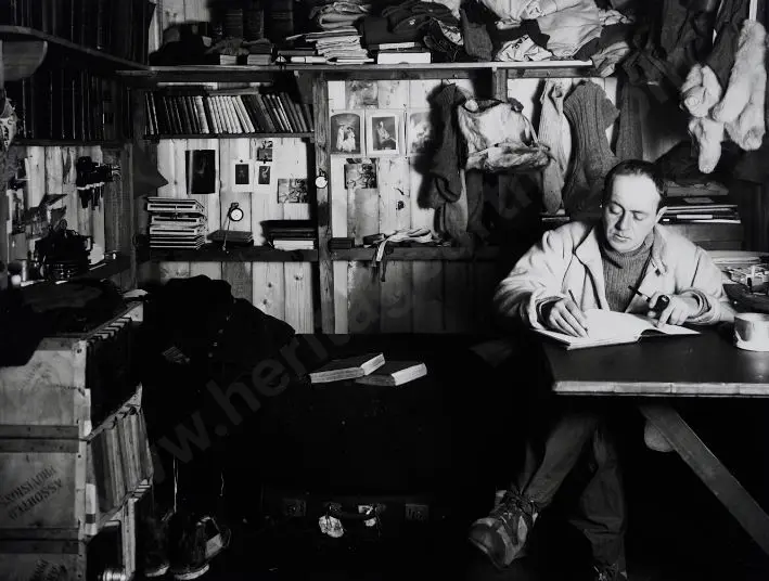 PONTING, Herbert (1870-1935) - Capt. Robert Scott writes in His Diary, Pipe in Hand, Oct. 7, 1911. Image 1++