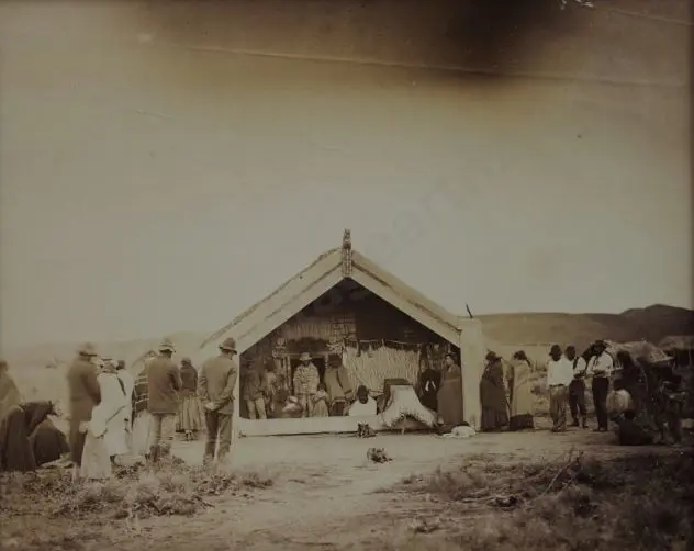 UNKNOWN - Tangi - Group of Maori Outside Whare Image 1++