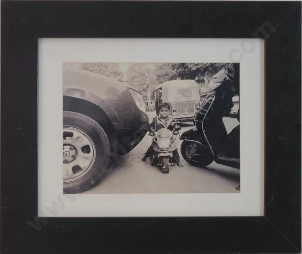 UNKNOWN photographer - Small Boy on Mini Motorbike (India) Image 1++