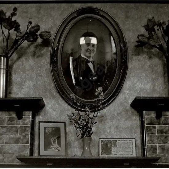 UNKNOWN - Mantlepiece with Flowers, Pictures & Photo, c.1920s
