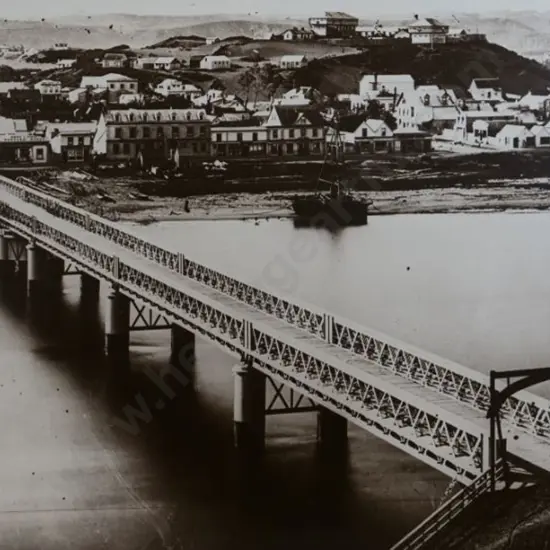 UNKNOWN Photographer - Taupo Quay and Old Wanganui Bridge leading into Victoria Avenue, with Rutland Stockade, 1871