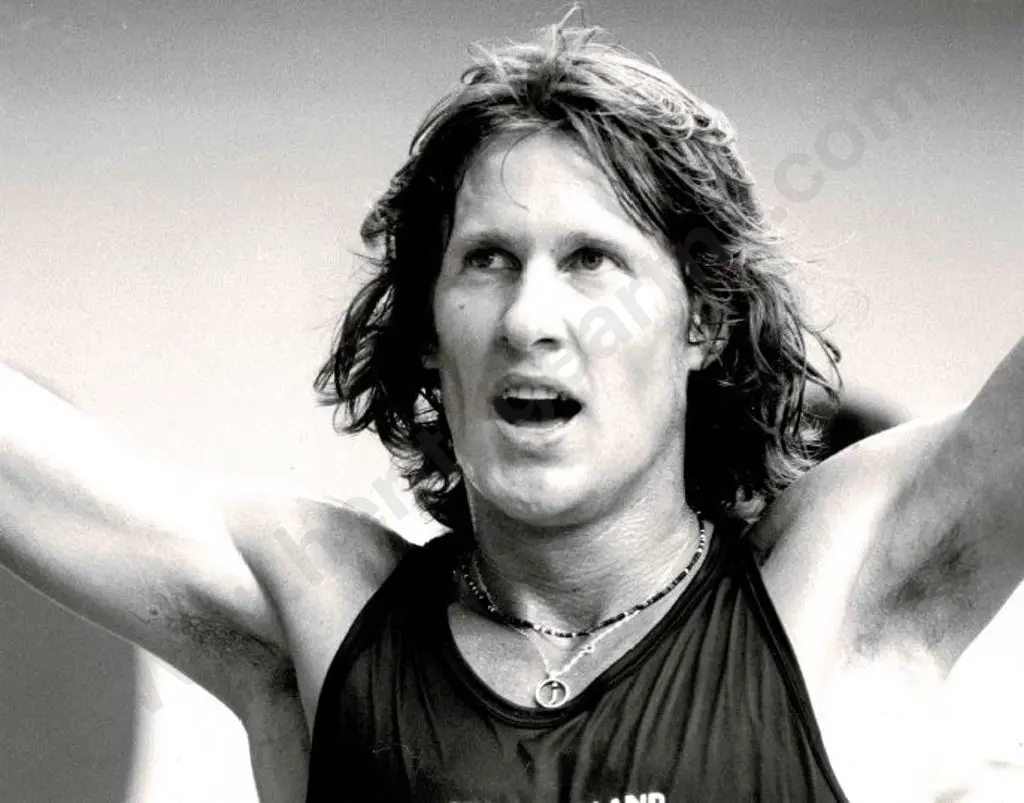 LACEY, E.D  (Active 1970s-1980s) - John Walker (NZ) Celebrates 1500m Victory 1976 Olympics Image 1++