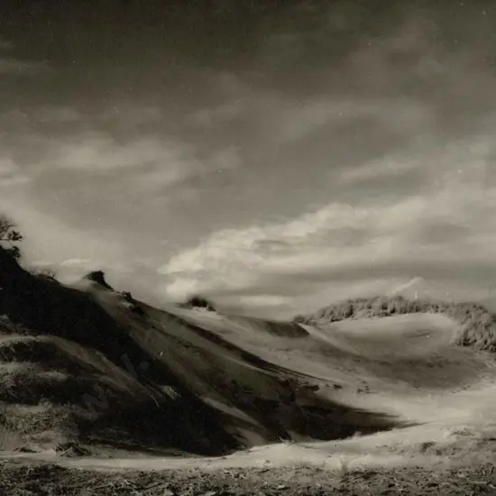 UNKNOWN - Sweeping Sand Dunes and Hillocks