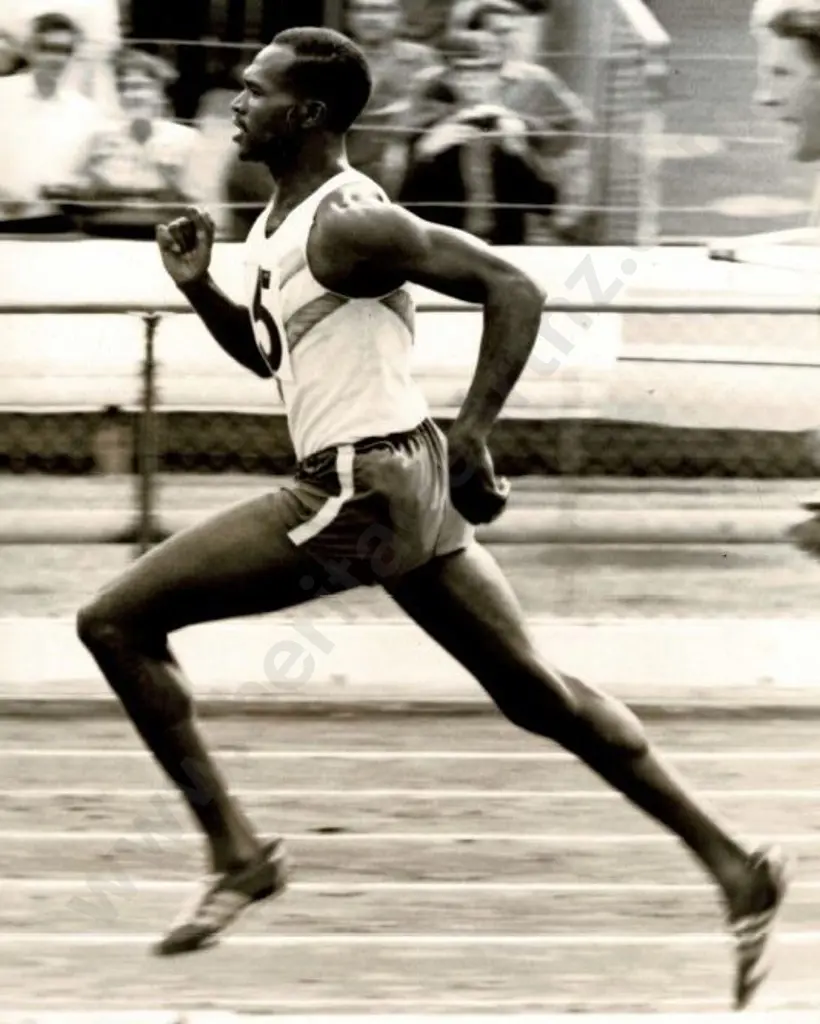 LACEY, E.D  (Active 1970s-1980s) - Keino Chipchoge (1940-) during World Mile, 1969 Image 1++
