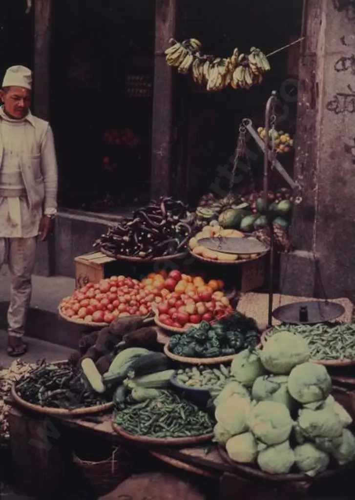 UNKNOWN photographer - Grocer in Kathmandu Vegetable Market, April '82 Image 1++